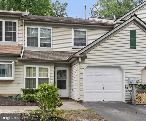 a view of a house with a garage