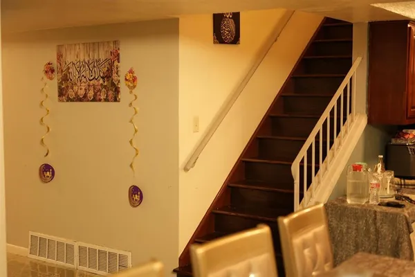 a view of a living room with furniture