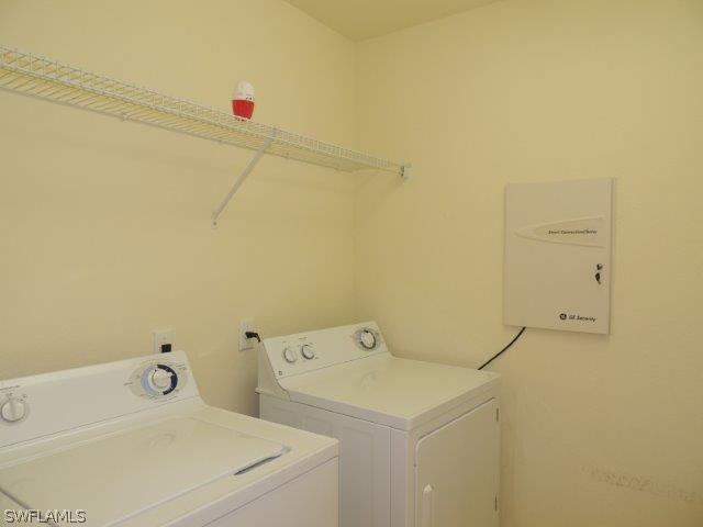19680 Villa Rosa Loop Fort Myers, FL 33967 - Photo 11 of 14 a utility room with dryer and washer