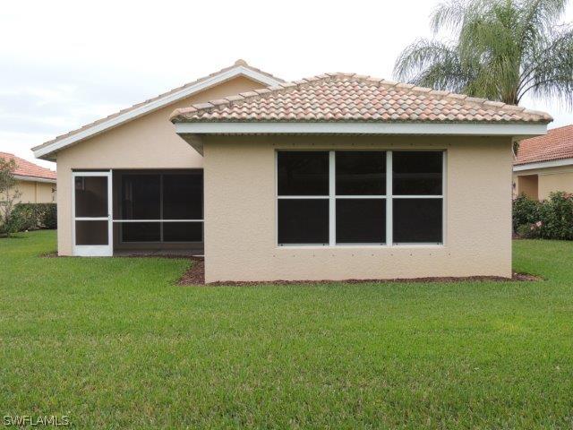 19680 Villa Rosa Loop Fort Myers, FL 33967 - Photo 14 of 14 a view of front of a house with a yard