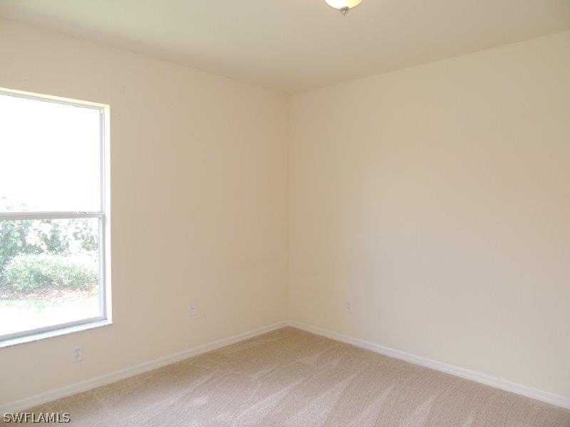 19680 Villa Rosa Loop Fort Myers, FL 33967 - Photo 8 of 14 an empty room with a window