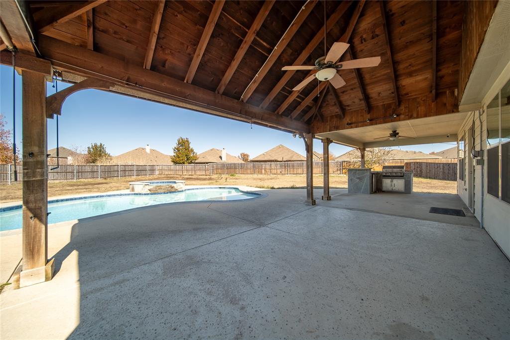 263 Archer Way Forney, TX 75126 - Photo 2 of 23 a view of a water heater room with a garage