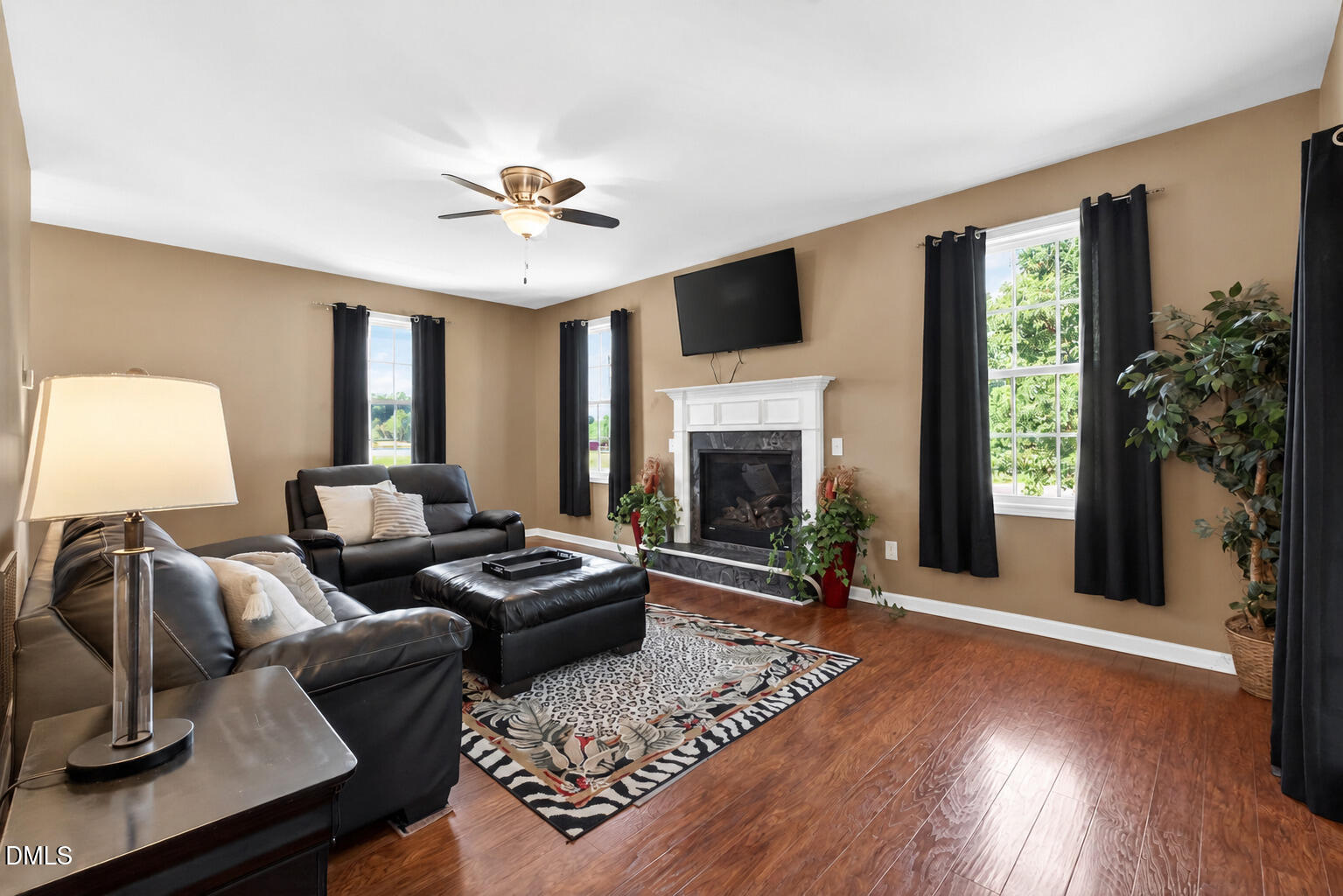 923 White Memorial Church Road Willow Spring, NC 27592 - Photo 15 of 46 a living room with furniture and a fireplace