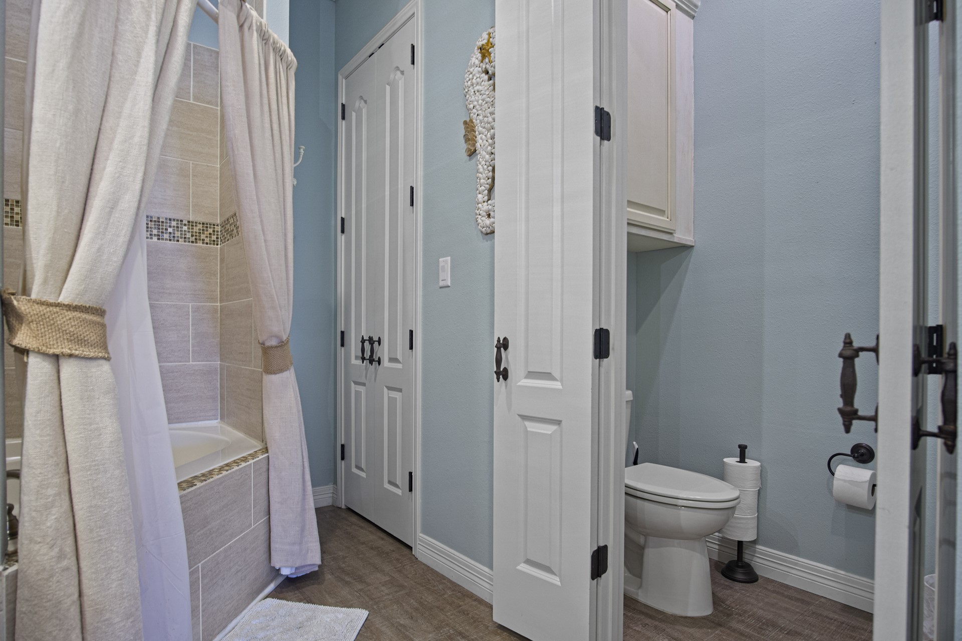 2573 Whitecap Crystal Beach, TX 77650 - Photo 14 of 50 a bathroom with a toilet and a shower