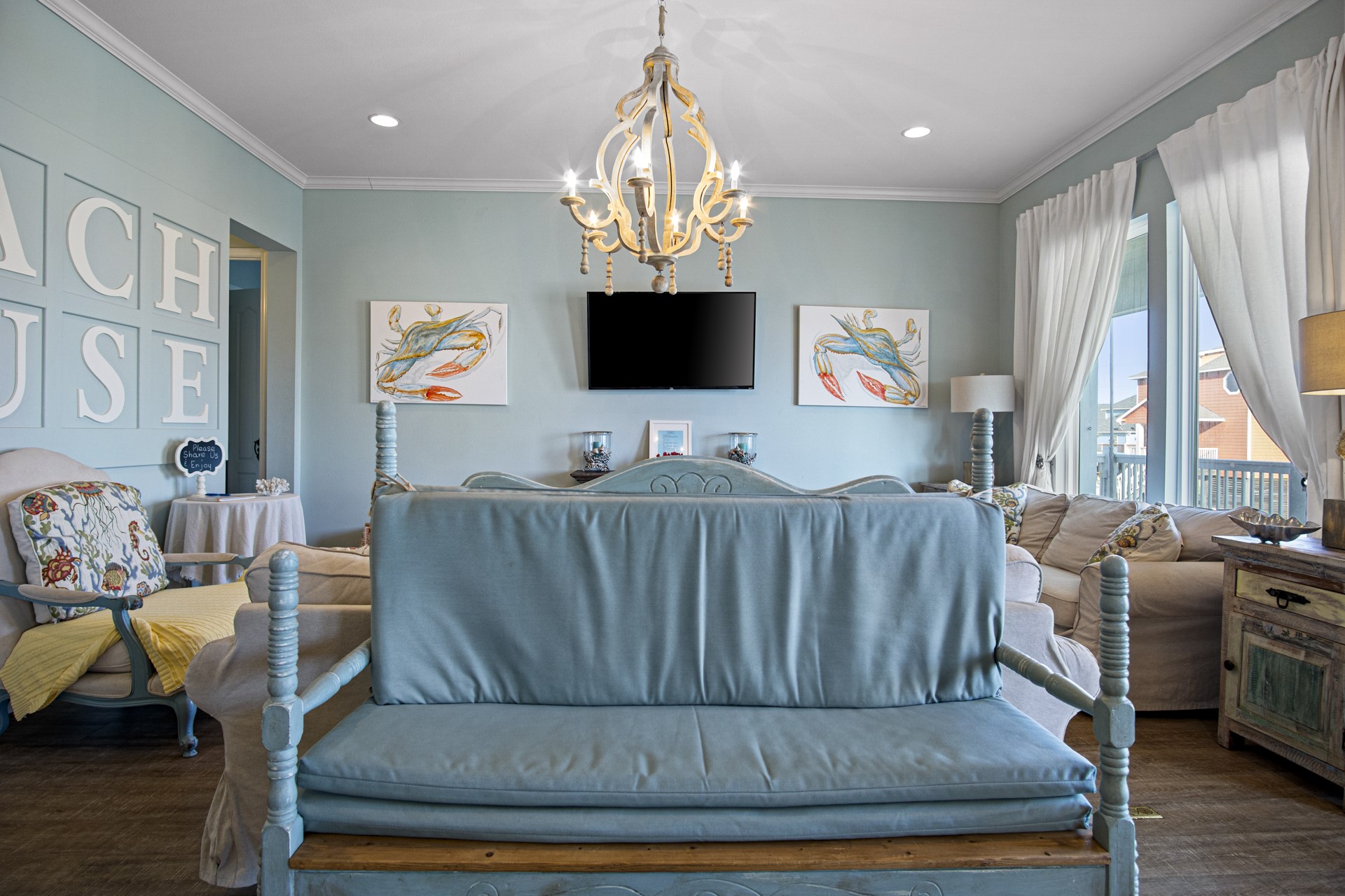 2573 Whitecap Crystal Beach, TX 77650 - Photo 16 of 50 a living room with furniture and a flat screen tv