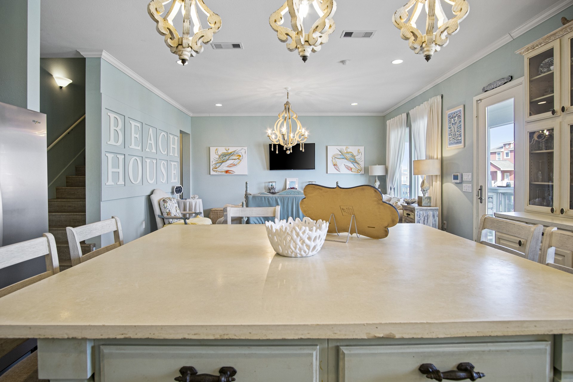 2573 Whitecap Crystal Beach, TX 77650 - Photo 25 of 50 a large kitchen with a table and chairs