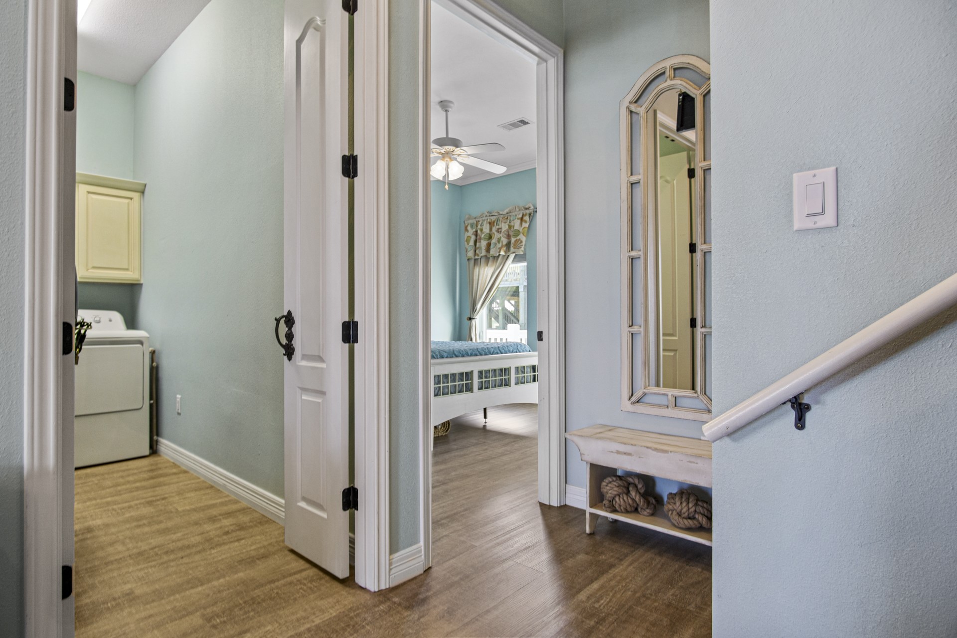 2573 Whitecap Crystal Beach, TX 77650 - Photo 26 of 50 a view of livingroom with hardwood floor and hallway