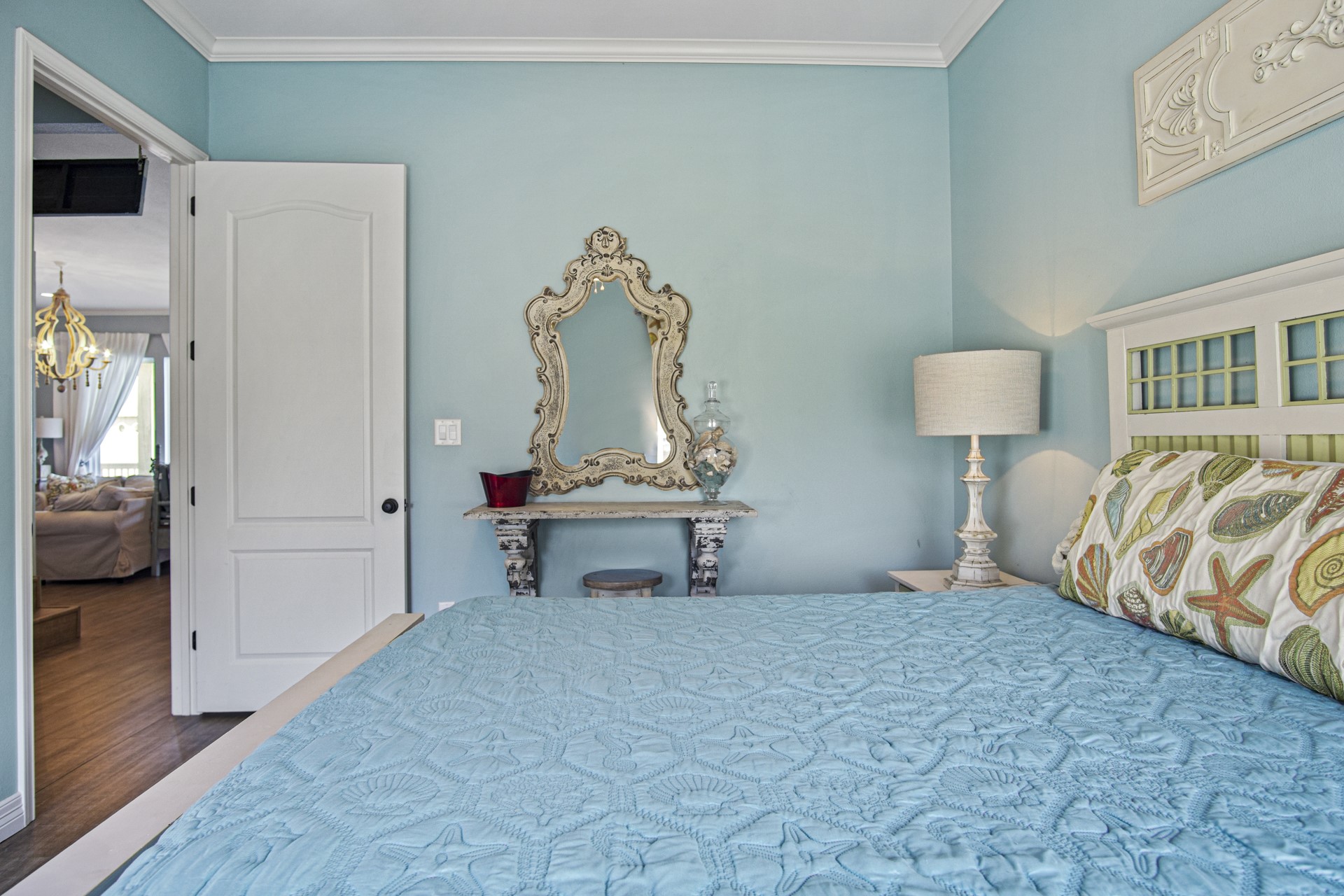 2573 Whitecap Crystal Beach, TX 77650 - Photo 29 of 50 a bedroom with a bed and a view of kitchen