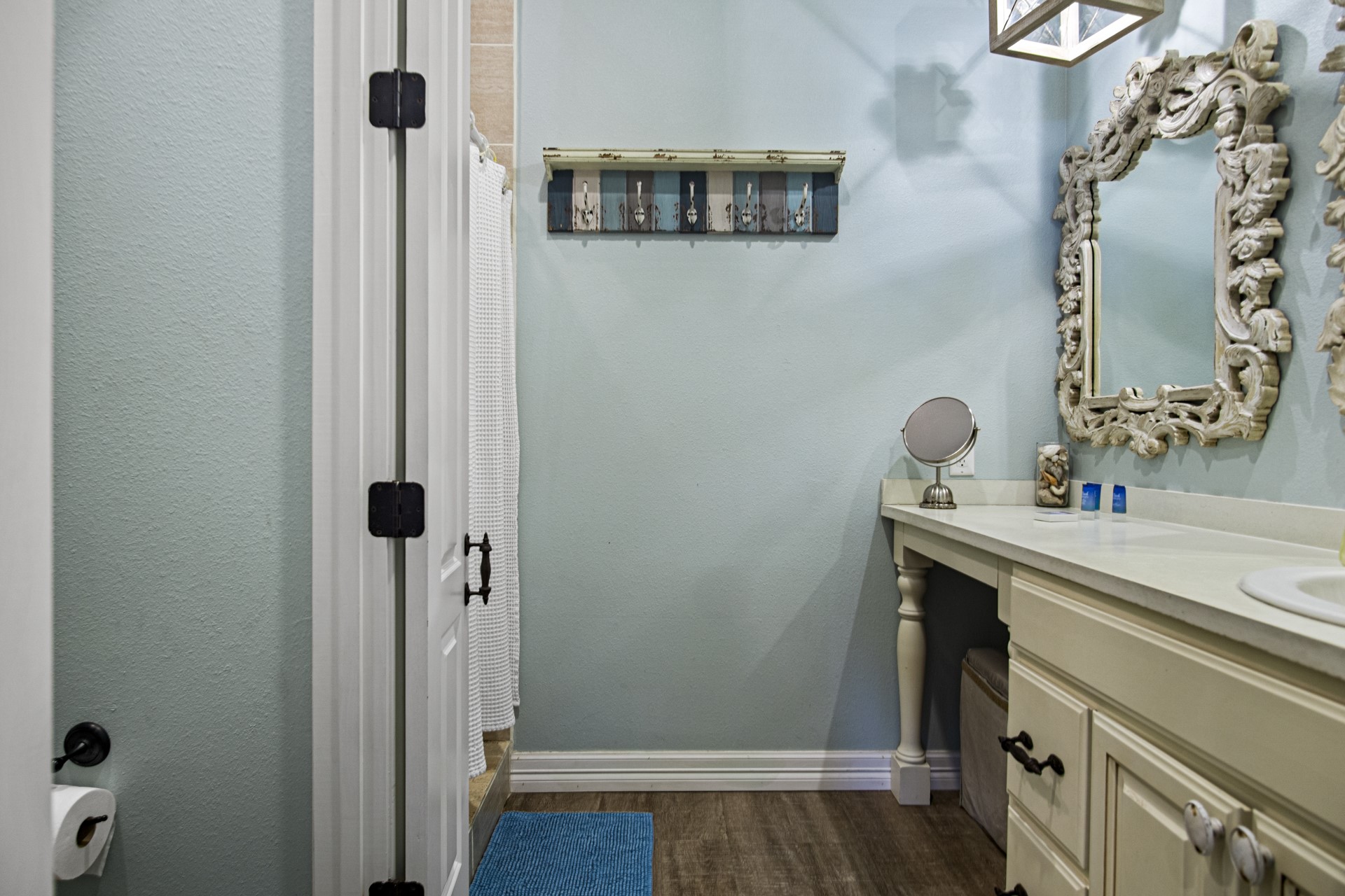 2573 Whitecap Crystal Beach, TX 77650 - Photo 30 of 50 a bathroom with a sink and mirror