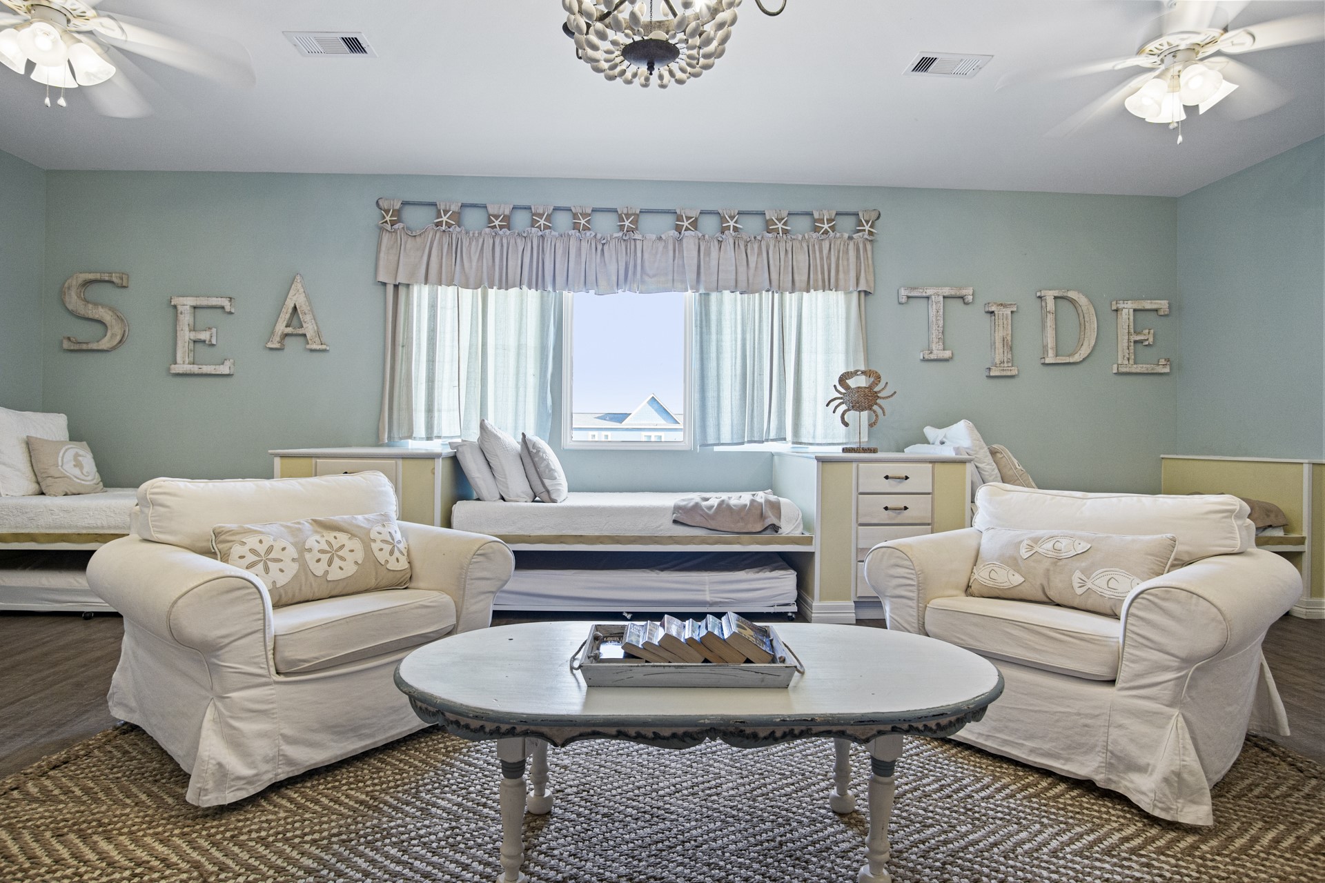 2573 Whitecap Crystal Beach, TX 77650 - Photo 35 of 50 a living room with furniture and a large window