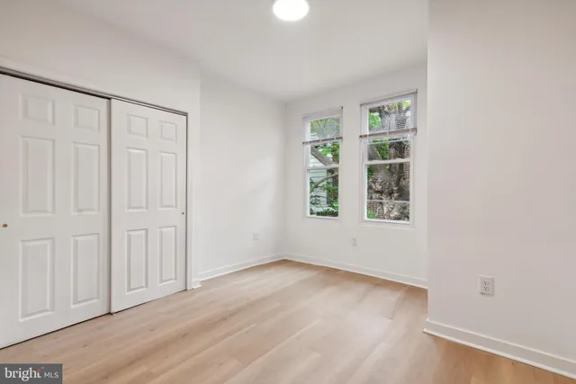 an empty room with windows