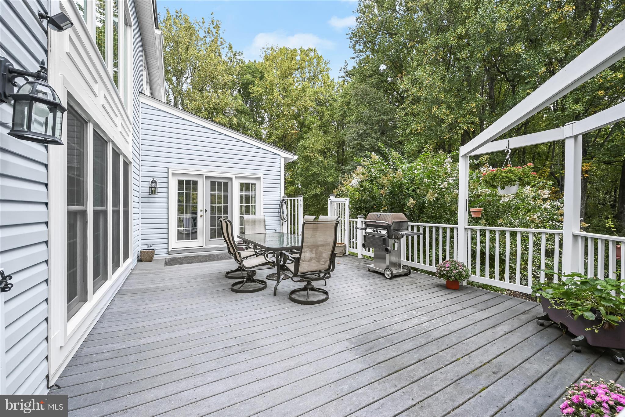 20521 Riggs Hill Way Brookeville, MD 20833 - Photo 13 of 34 Deck & Atrium Door to Sunroom