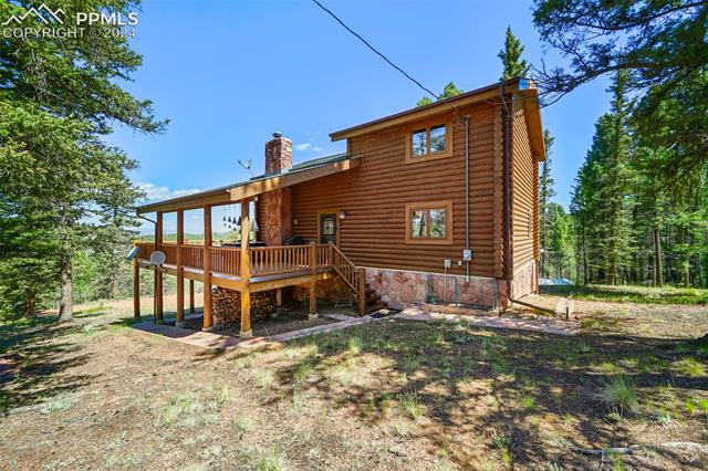 337 Porphry Road Florissant, CO 80816 - Photo 8 of 26 Back of property with a deck