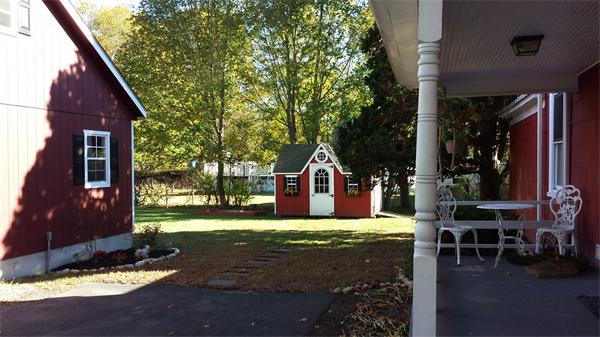 479 Main Street Hanson, MA 02341 - Photo 2 of 20 a view of a house with backyard porch and sitting area