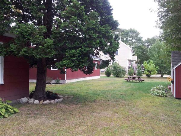 479 Main Street Hanson, MA 02341 - Photo 6 of 20 a view of a park with large trees