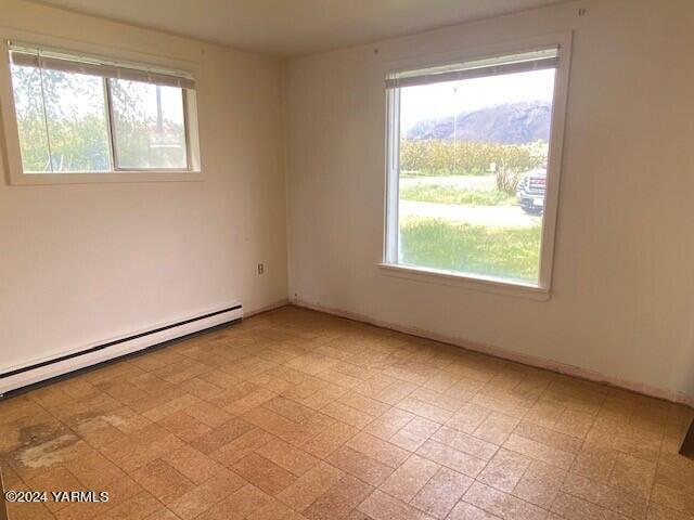 2451 Franklin Road Tieton, WA 98947 - Photo 4 of 15 an empty room with a window