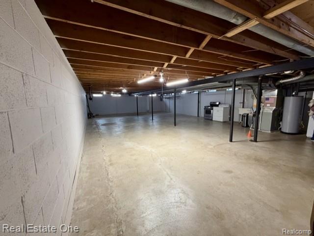 1115 Torpey Road Troy, MI 48083 - Photo 34 of 38 Unfinished basement featuring water heater and heating unit