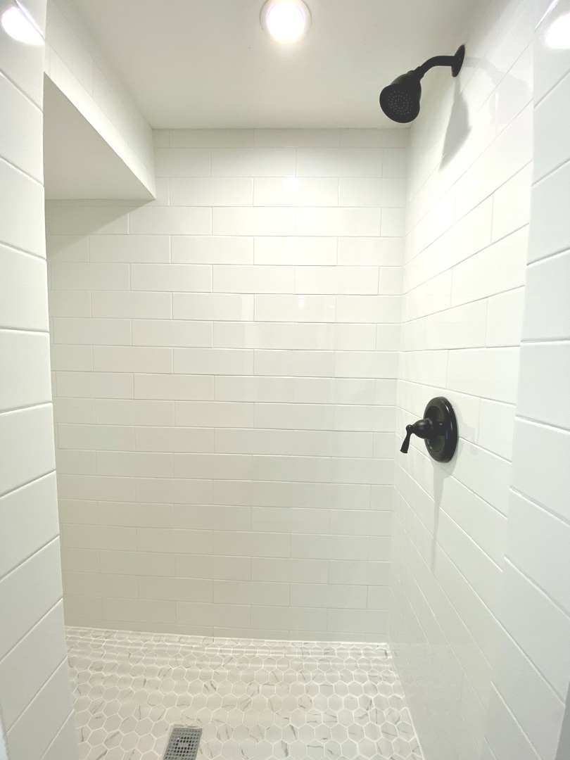 Undisclosed Address Chicago, IL 60617 - Photo 29 of 29 a bathroom with a shower
