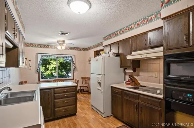 $399,900 | 802 Susan Road, Lake Ozark, MO 65049