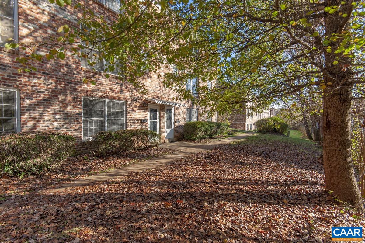2527 Hydraulic Road, Unit 51 Charlottesville, VA 22901 - Photo 14 of 18 a view of a house with a yard