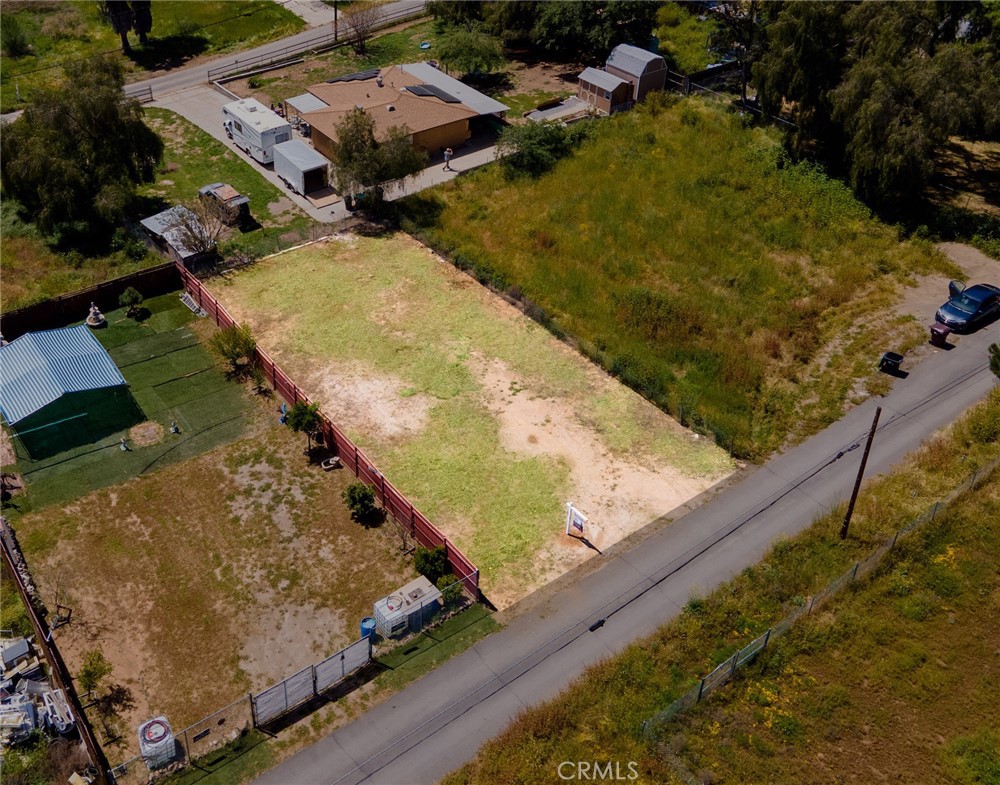 a view of a yard with an ocean view