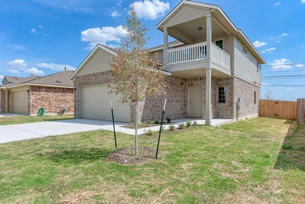 a house view with a outdoor space