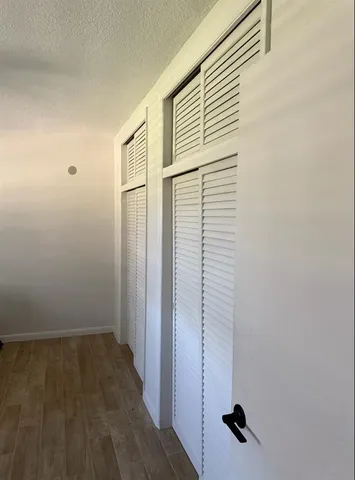 a view of a room with rack on the wall