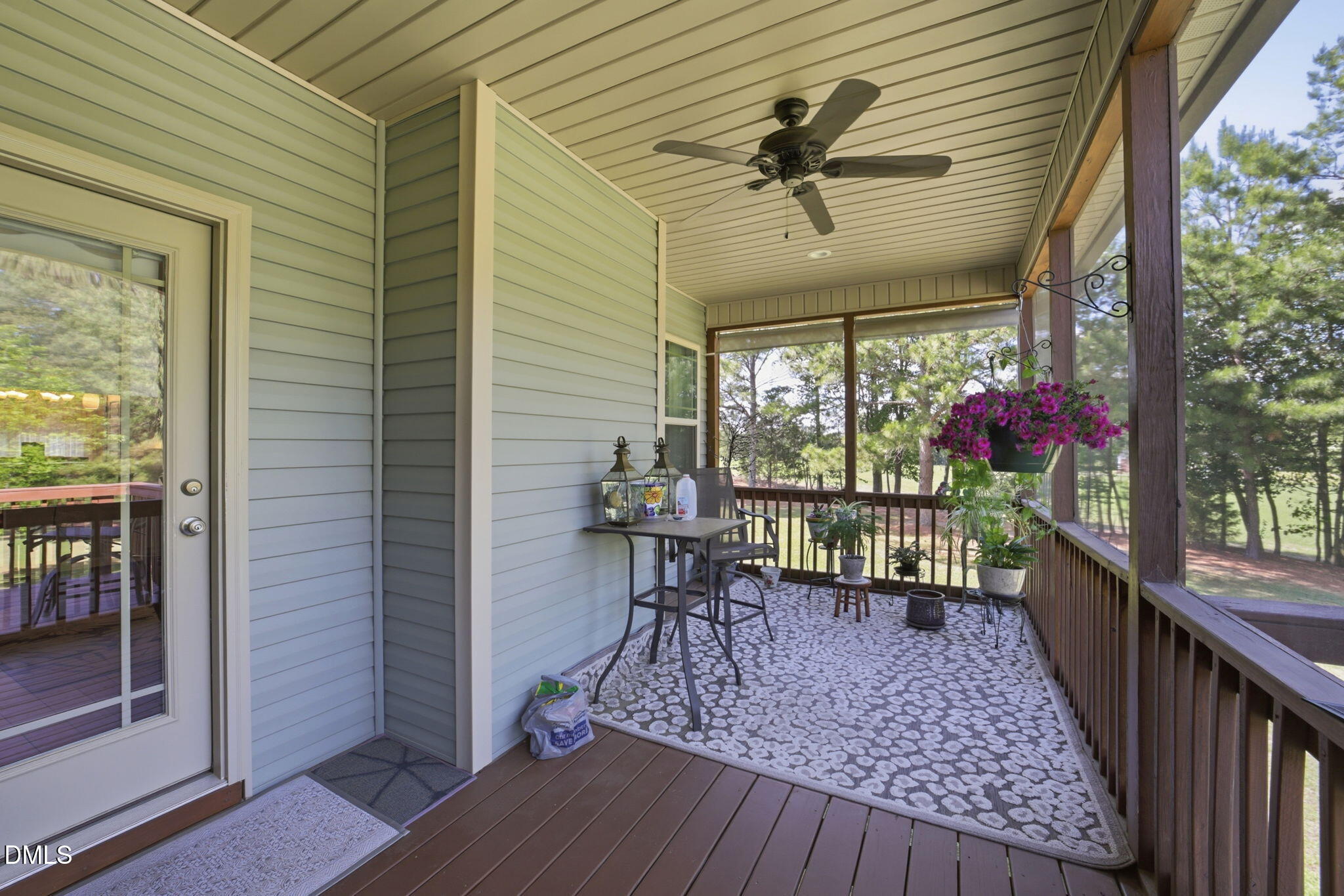 1547 Lassiter Pond Road Four Oaks, NC 27524 - Photo 30 of 45 a view of a porch with wooden floor
