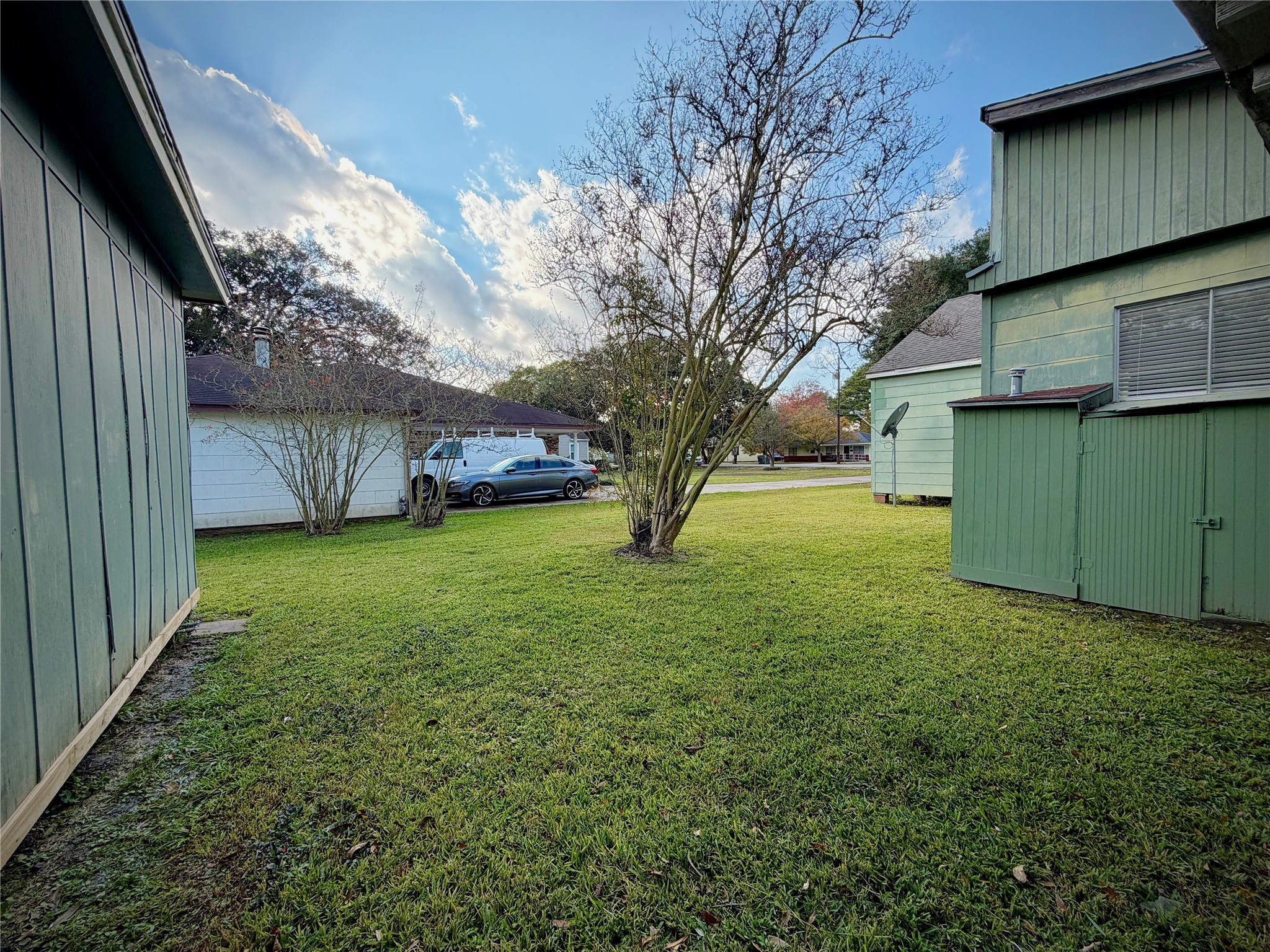 3124 30th Street Port Arthur, TX 77642 - Photo 22 of 25 a view of a backyard with a garden