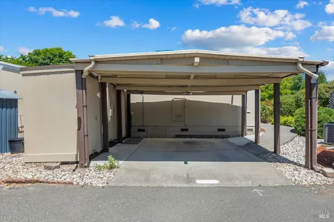 a view of a backyard of a house