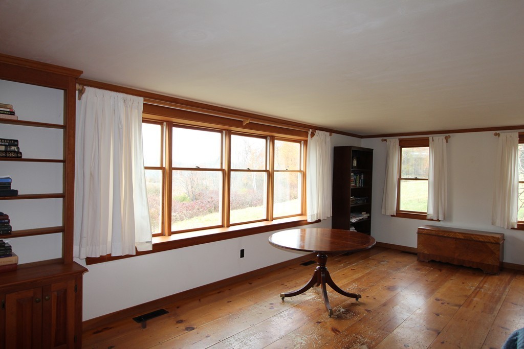 340 Still River Road Harvard, MA 01451 - Photo 3 of 13 a living room with furniture and a window