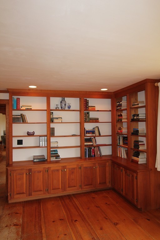 340 Still River Road Harvard, MA 01451 - Photo 4 of 13 a view of a room with wooden floor and shoes