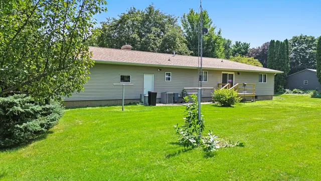 a view of a house with a garden