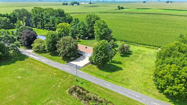 a view of a garden with an outdoor space