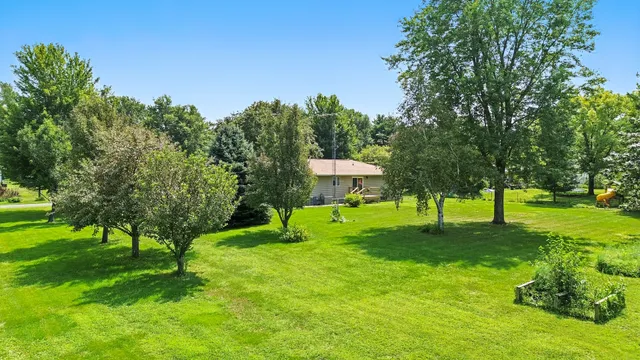 a view of a backyard with a garden