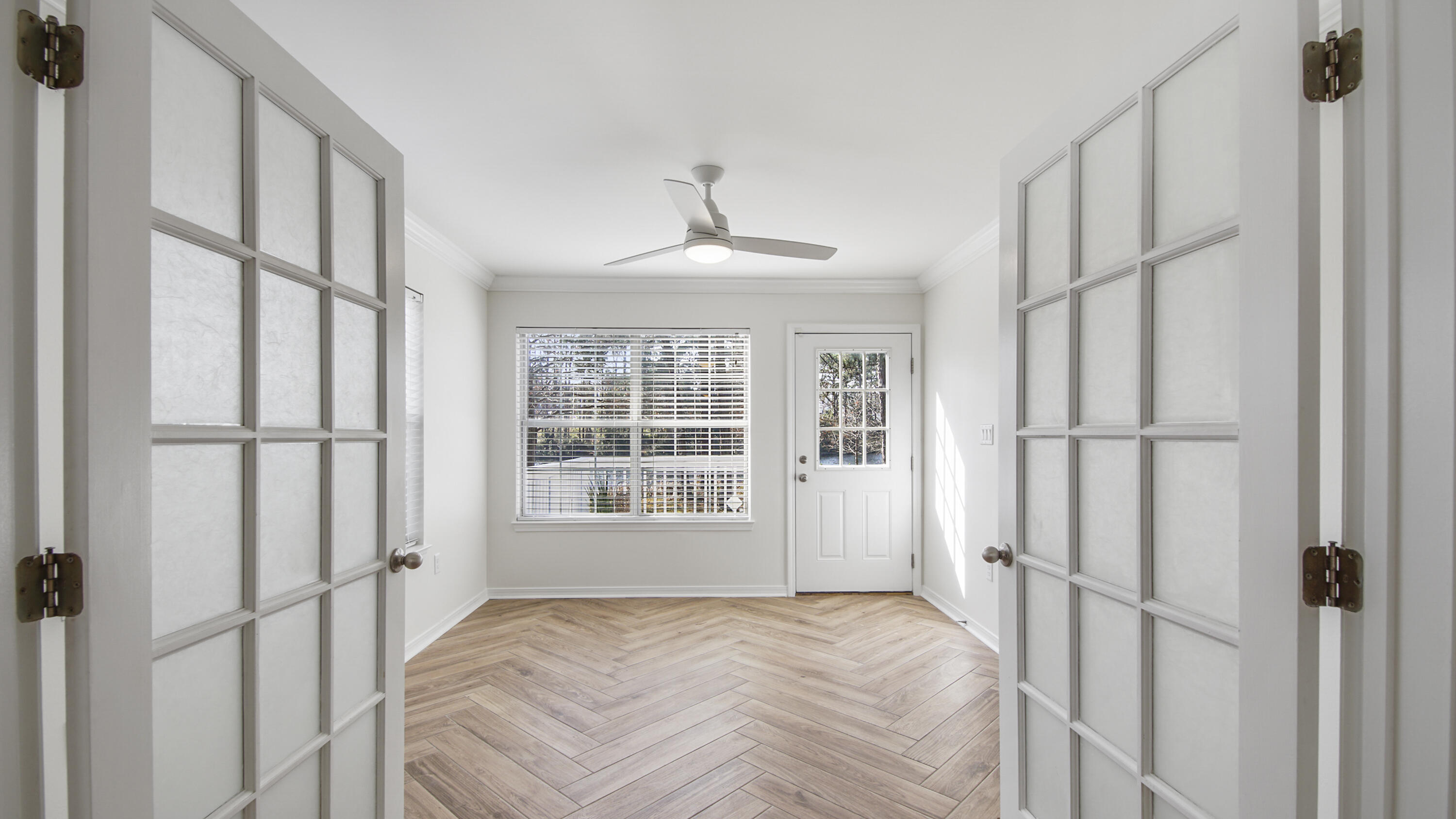 302 Liriope Loop Destin, FL 32541 - Photo 18 of 59 a bedroom with a bed and a window