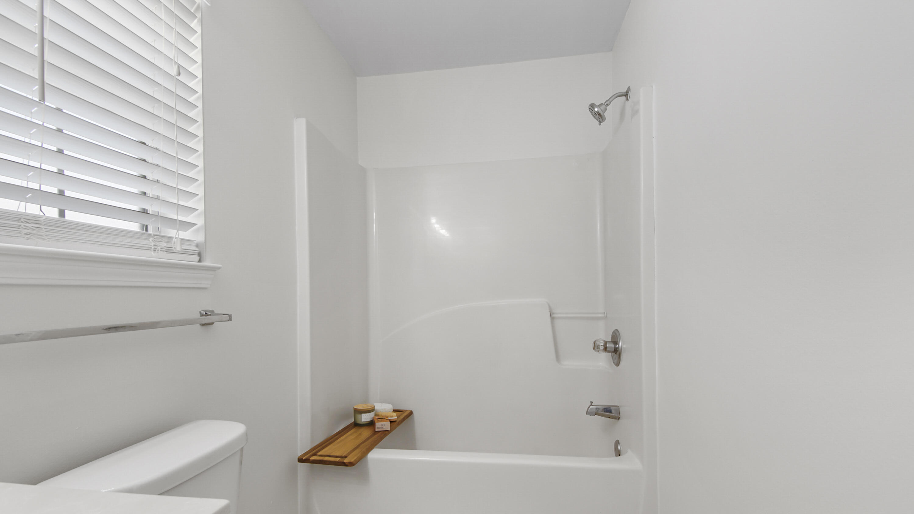 302 Liriope Loop Destin, FL 32541 - Photo 29 of 59 a bathroom with a bathtub