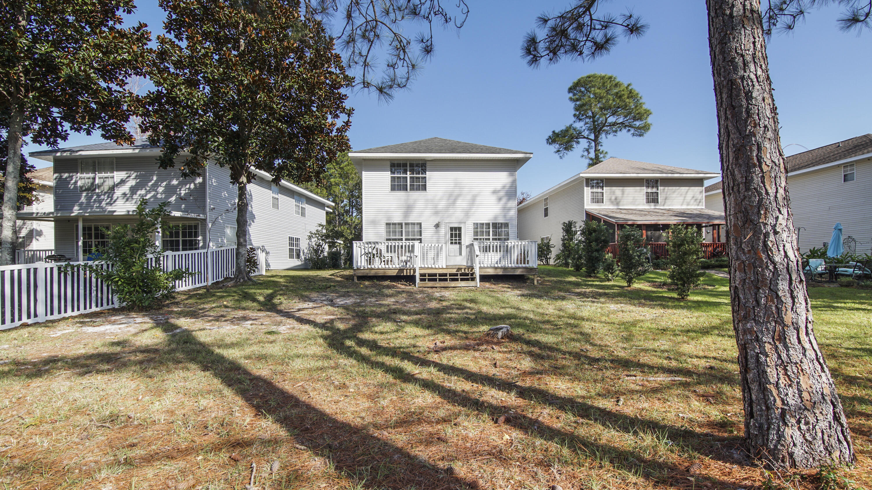 302 Liriope Loop Destin, FL 32541 - Photo 49 of 59 a view of a house with garden