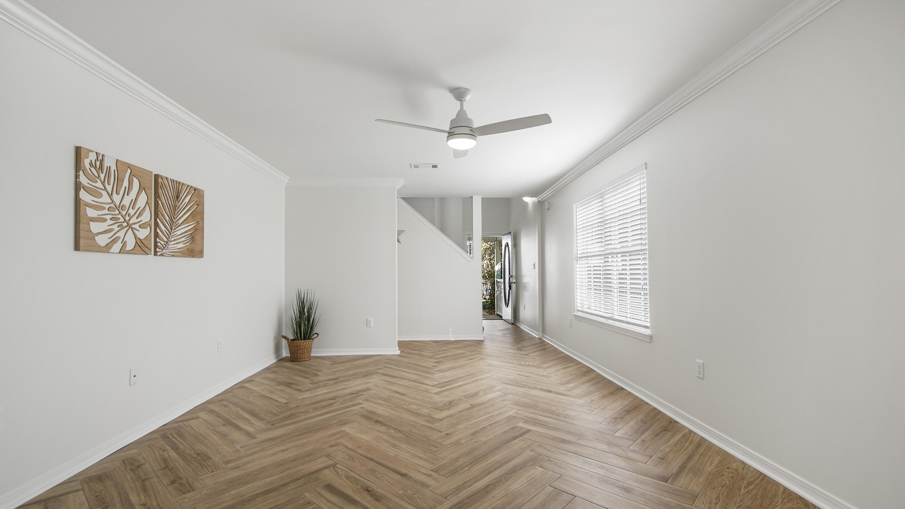 302 Liriope Loop Destin, FL 32541 - Photo 9 of 59 a view of an empty room with a window