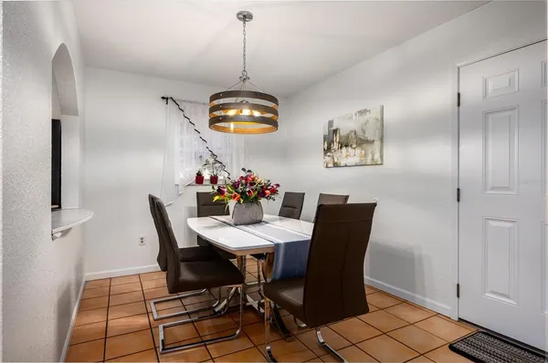 a view of a dining room with furniture