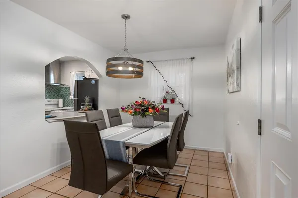 a view of a dining room with furniture