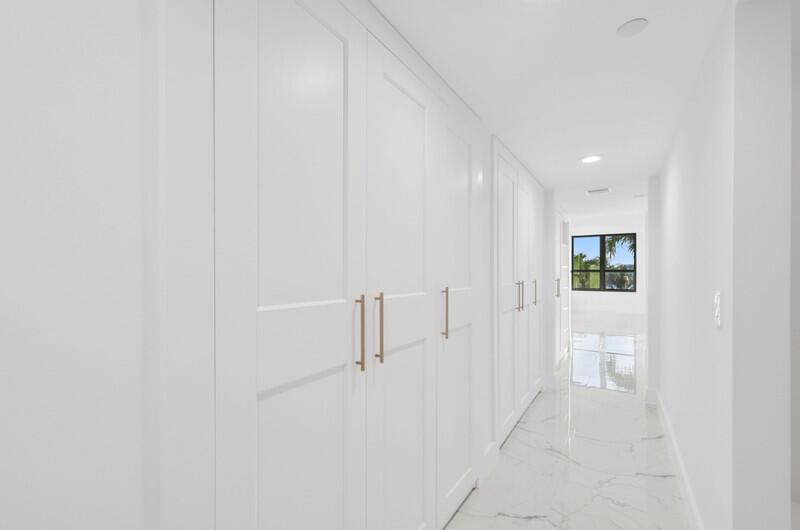19670 South Beach Road, Unit D314 Jupiter, FL 33469 - Photo 19 of 48 Hallway to Master Bedroom Bathroom