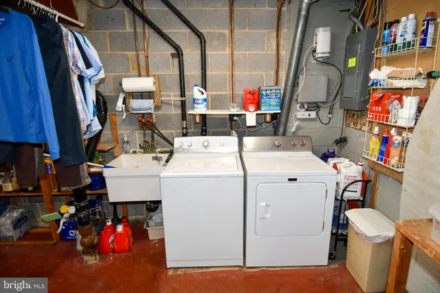 a utility room with dryer and washer