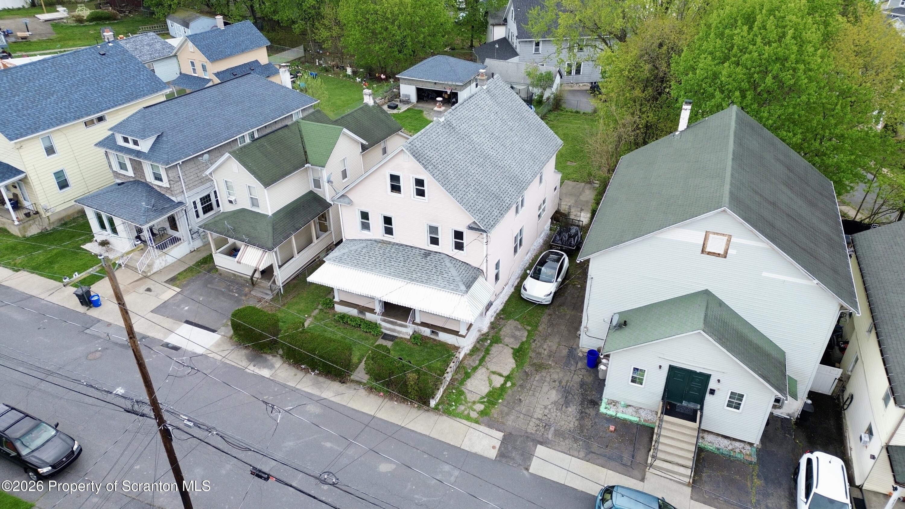 2115-2117 Wayne Avenue Scranton, PA 18508 - Photo 4 of 44 an aerial view of residential houses with outdoor space