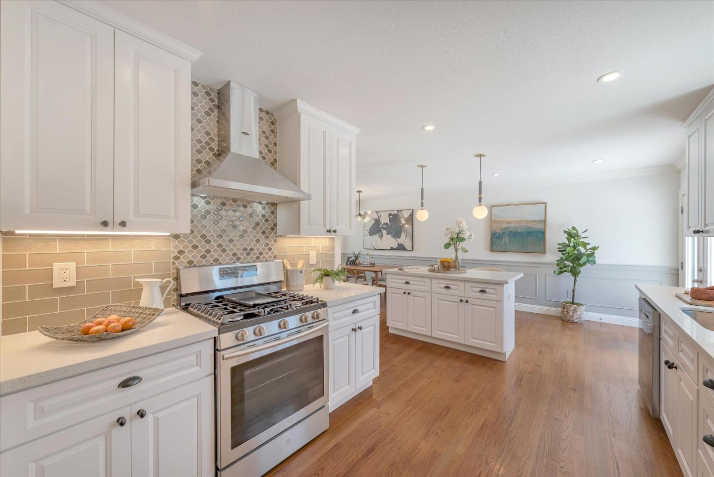 1314 Crestfield Drive San Jose, CA 95125 - Photo 12 of 43 a kitchen with stainless steel appliances a white stove top oven cabinets a sink and a wooden floor