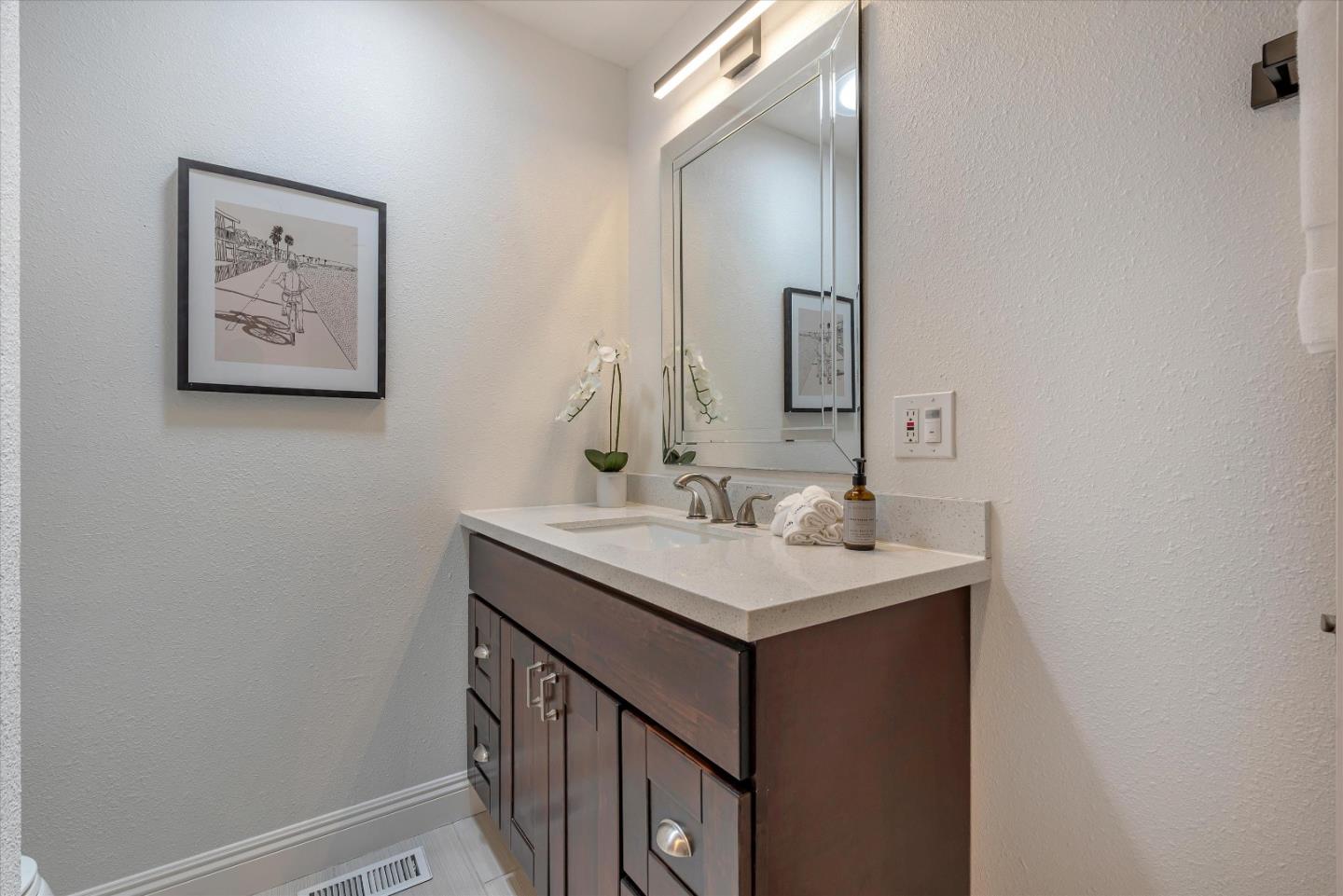 1314 Crestfield Drive San Jose, CA 95125 - Photo 24 of 43 a bathroom with a sink and a mirror
