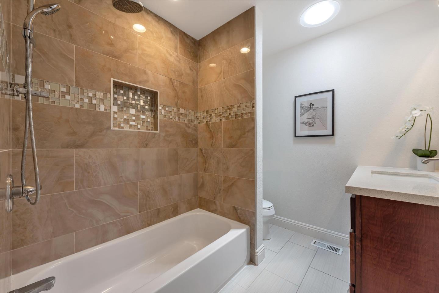 1314 Crestfield Drive San Jose, CA 95125 - Photo 25 of 43 a bathroom with a shower and a bath tub