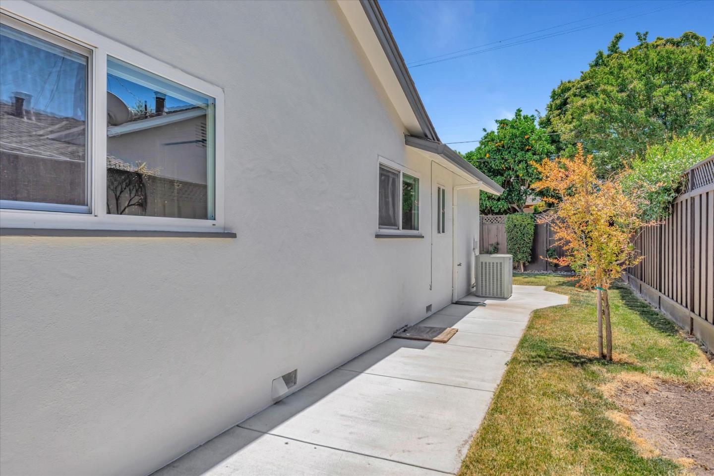 1314 Crestfield Drive San Jose, CA 95125 - Photo 40 of 43 a backyard of a house with table and chairs