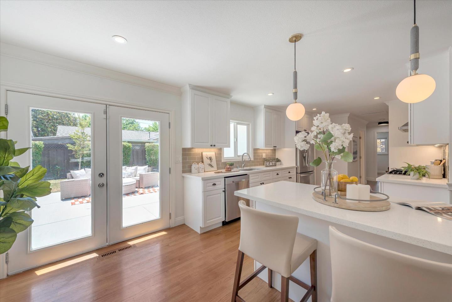 1314 Crestfield Drive San Jose, CA 95125 - Photo 8 of 43 a kitchen with a table and chairs