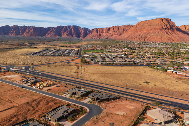 545 Wild Indigo Way, Unit 60 Ivins, UT 84738 - Photo 12 of 15 Aerial perspective of suburban area featuring a mountain backdrop